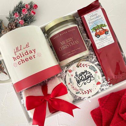 red christmas gift box. seasonal candle