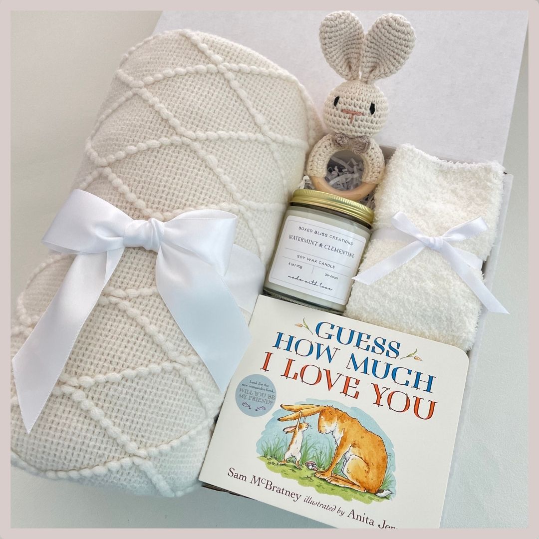 New Mom and baby gift basket with baby book, soy wax candle, fuzzy socks, crochet baby rattle, soy wax candle